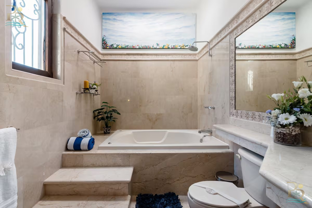 Property gallery Tropical retreat with beach access and golf course views